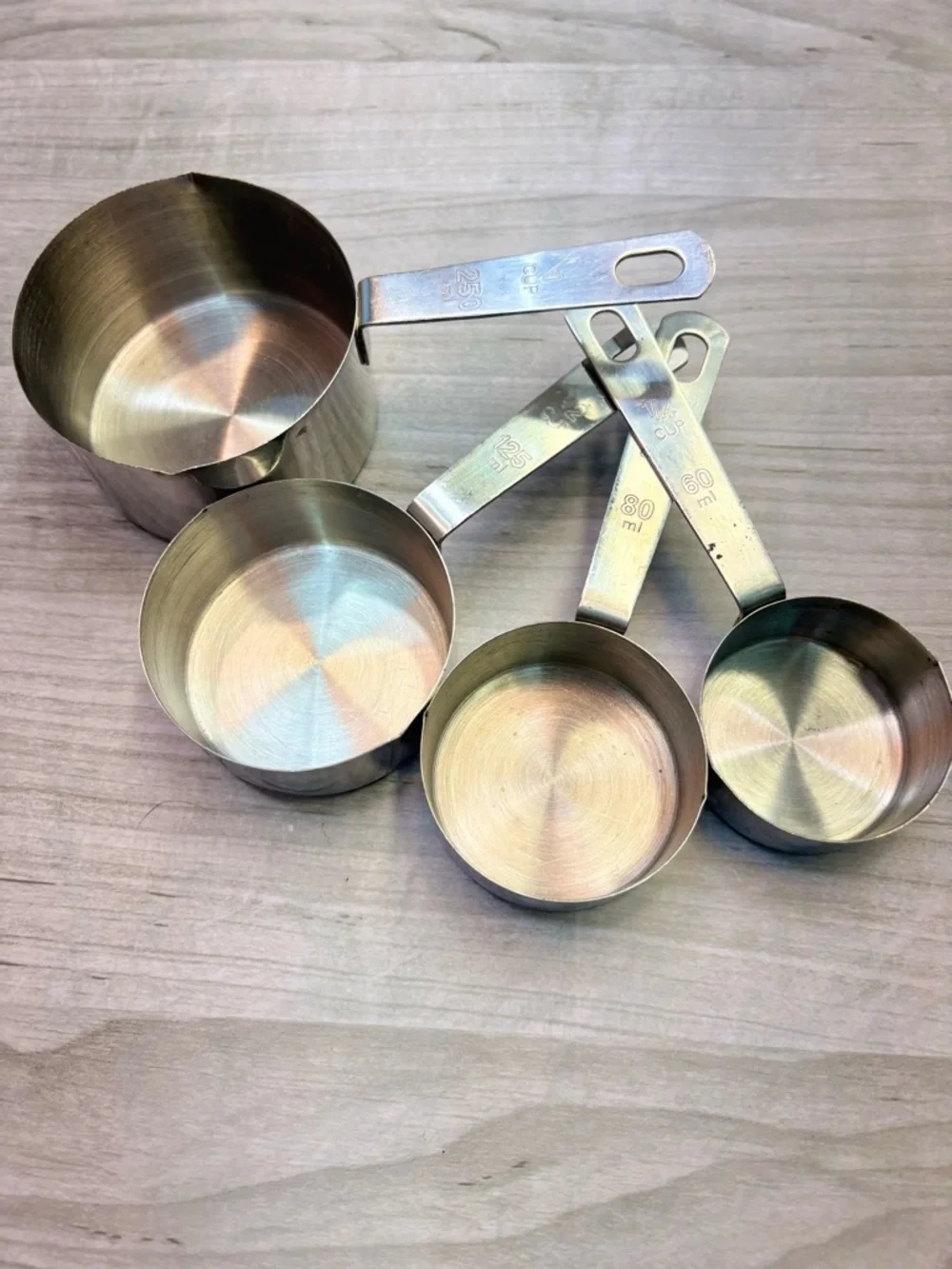 World Market Metal Brass Tone Stainless Steel Measuring Cups Set